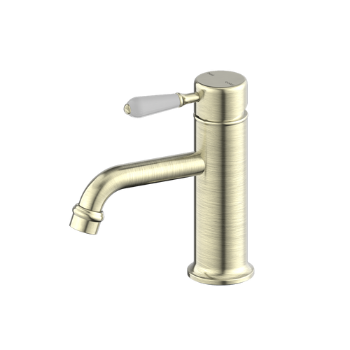 York Straight Basin Mixer With White Porcelain Lever Aged Brass